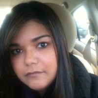 Elvia Touron, Aas, Aic