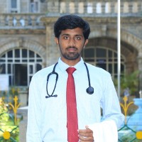 Dr Purushotham K