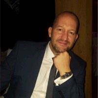 John Woods, Aminstlm