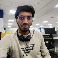 Dinesh E