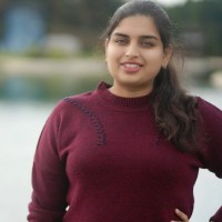 Rashmi M