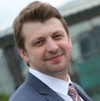 K. Taha Buyukhelvacigil