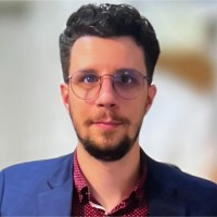 Mark E.