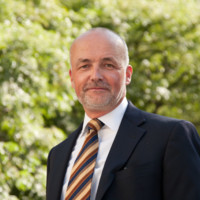 Alex Bogaard, MBA, ARM, CIC, CRIS