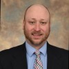 Justin Mezger, Mba