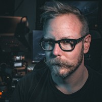 Adam E.