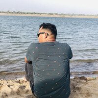 Rushi P