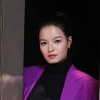 Yishi Huang