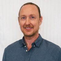 Dr. Damian Poustie