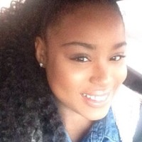 Janelle M.