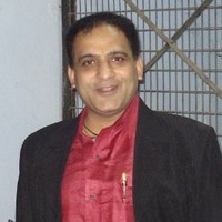Dr Anil Minocha