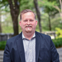 Tony Schmitz,   AIA  LEED AP