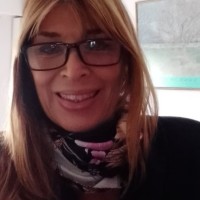 Laura I.
