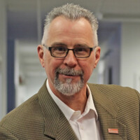 Eric J. Mullins