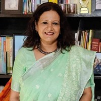Sudha E