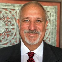 Reagan Schwarzlose, FRICS, CRE, MAI, CCIM