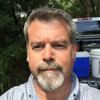 Mike Simmons, P.G.