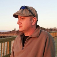 Tim Hughes