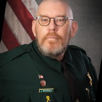 Justin Woodall, Mpa