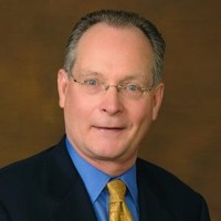 John M. Collins, Lutcf