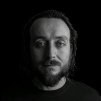 Mustafa E.