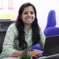 Aruna M