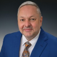 Mark E. Troy, Esq.