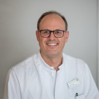 Dr. Marc Achilles