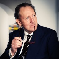 Professor John M. Mohin OBE D.Univ DL