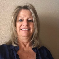 Glenna Phelps-Aurich, Iom