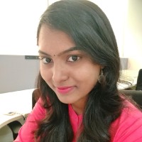 Aruna M