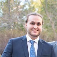Justin Doucet, Cfa