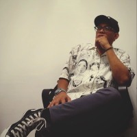 Mac E.