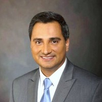 Victor Delacruz, D.B.A.