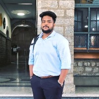 Tejash M