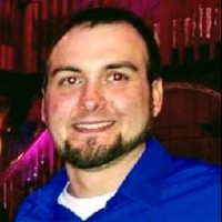 Eric M Slott