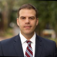 Tyler J. Derr