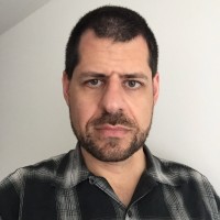 E. Aaron Kozlowski