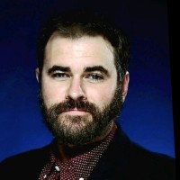 John K. M.
