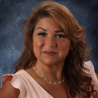 Lynne West, R.N., M.B.A.