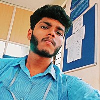 AMAN M K