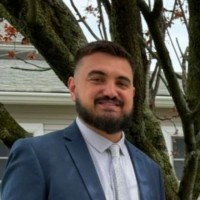Louis Bozzella, Mba
