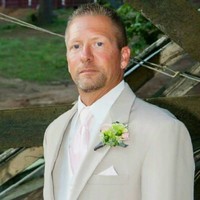 Mark E.