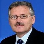 John A Doukas