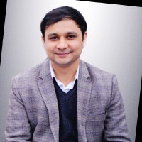 Dr. Tej Singh