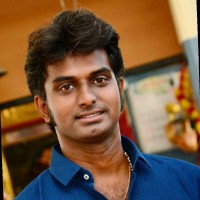 Sudharshan E