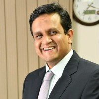 Dr. Arslan A. Siddiqi, Ph.D(Management Sciences), Pharmacist