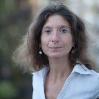 Evelyne V.