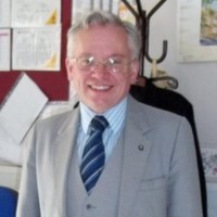 Adrian de Redman, FSAScot, FFI, HonFHS, LCGI