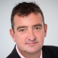 Simon Curry